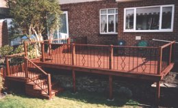 raised deck, wrought iron railing panels