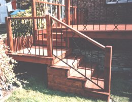 Steps with wrought iron rail side panels